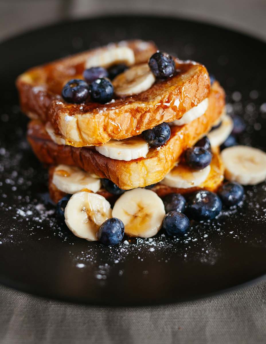 french toast toast bread with blueberry on black plate blueberry
